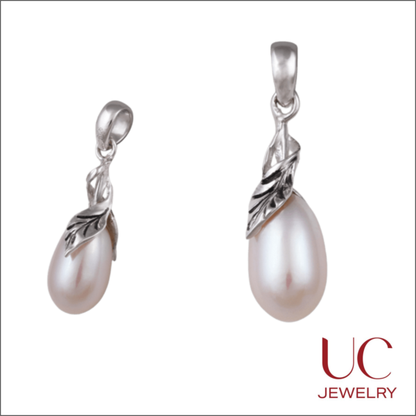 Discover organic luxury with UC Jewelry's Pearl & Leaf collection. Hand-selected freshwater pearls meet artisan silver craftsmanship. Experience the perfect blend of botanical beauty and sophisticated luster.