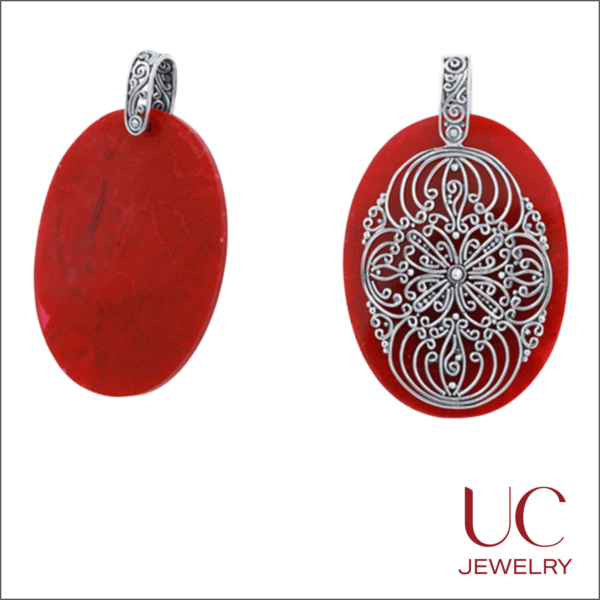 Discover the elegance of the UC Jewelry Red Coral Filigree Pendant. This stunning oxidized silver overlay necklace features a vibrant red oval stone encased in an intricate vintage floral mandala design. Perfect for bohemian style or a bold statement look.