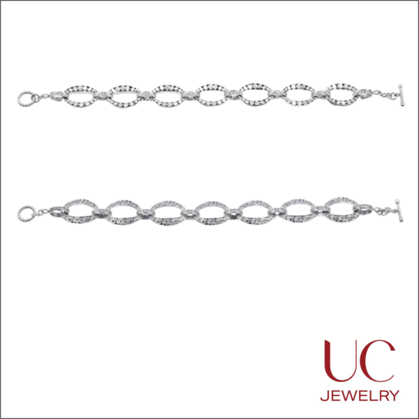 Make a statement with UC Jewelry’s Sterling Silver Toggle Bracelets. Choose between shimmering diamond-cut or antique scrollwork patterns. High-quality craftsmanship meets timeless design. Shop the collection now!