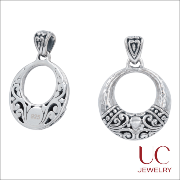 Make a statement with our Artisan Scrollwork Pendant. Crafted from genuine 925 silver, this ornate "donut" design features stunning filigree accents and a textured hammered finish. A versatile, high-polish piece that adds a touch of bohemian luxury to any chain.