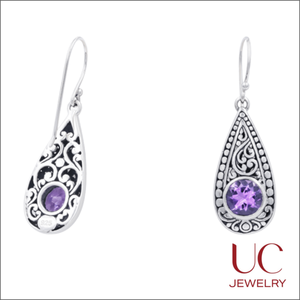 Exquisite 925 Sterling Silver Teardrop Earrings featuring a vibrant, round-cut Amethyst centerpiece. These artisanal drops showcase intricate oxidized filigree scrollwork and a beaded border, blending vintage charm with a modern boho-chic aesthetic. Lightweight and elegant, they are finished with comfortable fishhook wires—perfect for daily wear or as a thoughtful February birthstone gift.