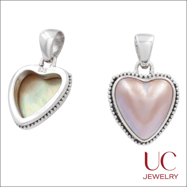 Radiate romance with this 925 Sterling Silver Pink Mother of Pearl Heart Pendant. Featuring a luminous, iridescent shell inlay and a delicate milgrain beaded border, this vintage-inspired charm blends artisanal detail with timeless elegance. Perfect as a meaningful gift or a signature daily piece. Quick Highlights Material: Genuine 925 Sterling Silver (Hallmarked). Stone: Iridescent Pink Mother of Pearl. Design: Puffed heart shape with a polished tapered bail. Style: Romantic, Vintage-Chic, and High-Luster.