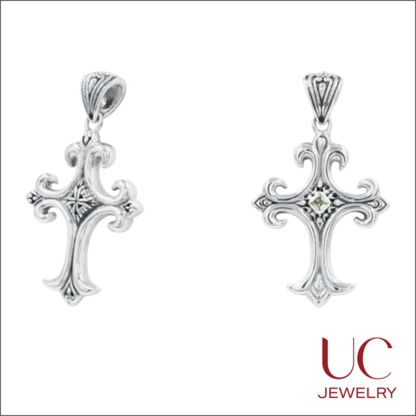 Discover the perfect blend of faith and fashion. This exquisite green gemstone cross necklace features a reversible starburst design and oxidized silver finish. A timeless gift for any occasion. Explore the collection at UC Jewelry.
